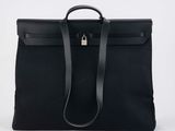 a black bag with a lock on the front