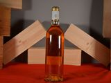 a bottle of wine that is sitting on a table