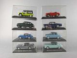 six different models of cars in a display case