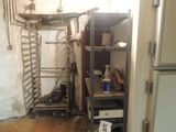 an image of a room with a ladder and shelves