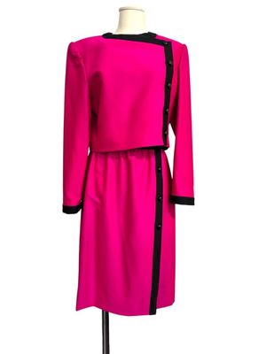 a close up of a pink dress on a mannequin mannequin