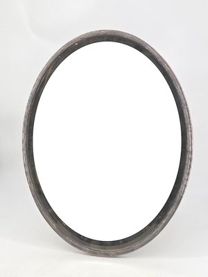 a picture of a round mirror on a white background