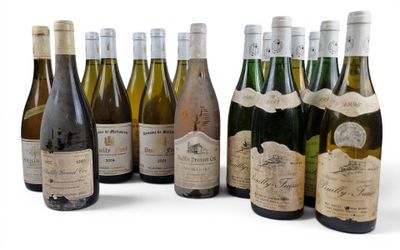 several bottles of wine are lined up on a white surface