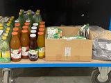 a blue cart with a lot of bottles and bottles on it
