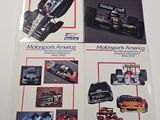 two books on the table with pictures of racing cars