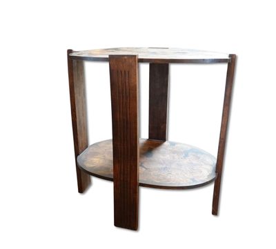 une image représentant une table ronde au plateau en marbre