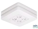 a close up of a ceiling light with a white cover