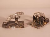 pair of silver plated animal bookends on marble bases
