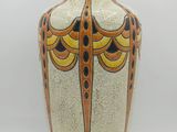 a vase with a design on it on a white background