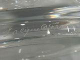 a close up of a glass jar with a horse on it