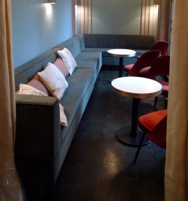 an image of a living room with a couch and a table