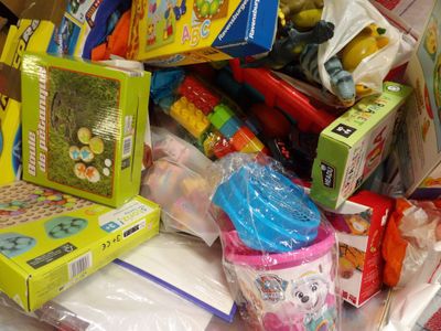a pile of children ' s toys and toys on a table