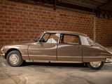 a brown car that is parked in a garage