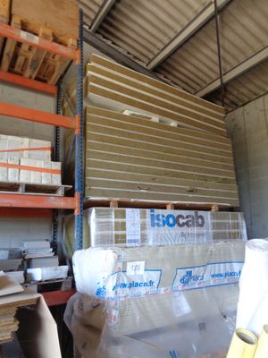 boxes and pallets are stacked on a pallet in a warehouse