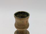 a small vase that is sitting on a table