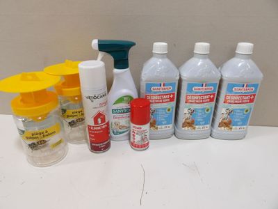 several bottles of cleaning products sitting on a counter