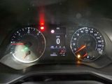 a close up of a car dashboard with a speedometer and gauges