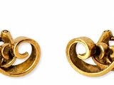 two pairs of gold tone earrings with swirl designs on them