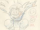 dessin représentant un jeune Gohan, les bras tendus et les mains levées vers le ciel