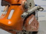 a close up of a motorcycle with a chain attached to it