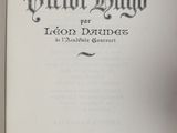 an open book with a black and white title on it
