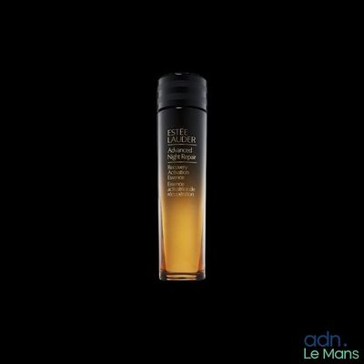 a bottle of shisei advanced night repair concentrate on a black background