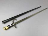 a close up of two swords on a white surface