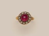 a ruby and diamond cluster ring