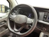 a steering wheel and dashboard of a car in a car showroom