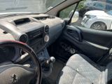 dashboard of a car with a steering wheel and dashboard controls