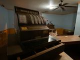 a cash register sitting on top of a counter