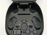 a black case with a game controller inside of it