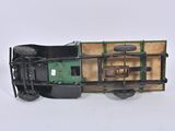 a toy train car that is sitting on a white surface