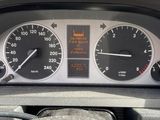 a close up of a car dashboard with a speedometer and gauges