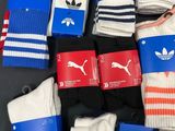 several pairs of socks are laid out on a table