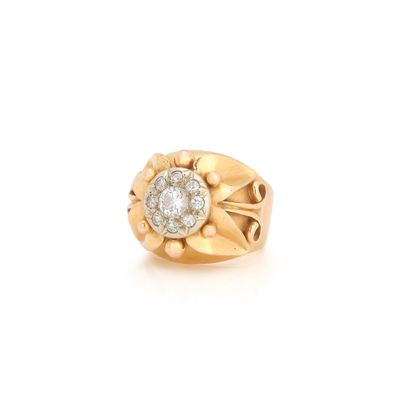 an 18k yellow gold and diamond ring