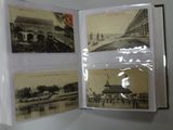 a picture of a book opened to show pictures of buildings