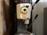 an image of a kitchen with a mixer and a pot on the stove