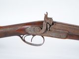 a close up of a gun on a white background with a white background