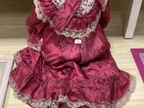 a doll that is sitting on a table in a room