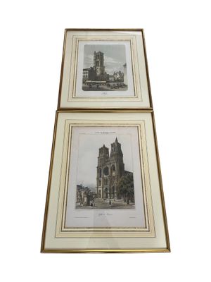 two framed pictures of a building with a clock tower on top of it