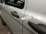 a white car with a sticker on the side of it
