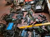 a lot of wires and other electrical equipment on the floor