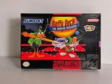 une photo d'une boîte de jeux Nintendo posée sur une table