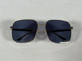 a close up of a pair of sunglasses on a white surface