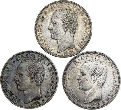 trois types différents de pièces d'argent sur lesquelles figure le visage d'un homme