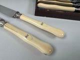three knives that are sitting next to each other