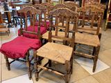 many chairs that are lined up in a room
