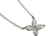 an image of a silver necklace with a flower design on it