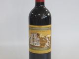 a bottle of wine that is sitting on a table